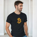 Man wearing a black t-shirt with a Bitcoin symbol in a minimal indoor setting