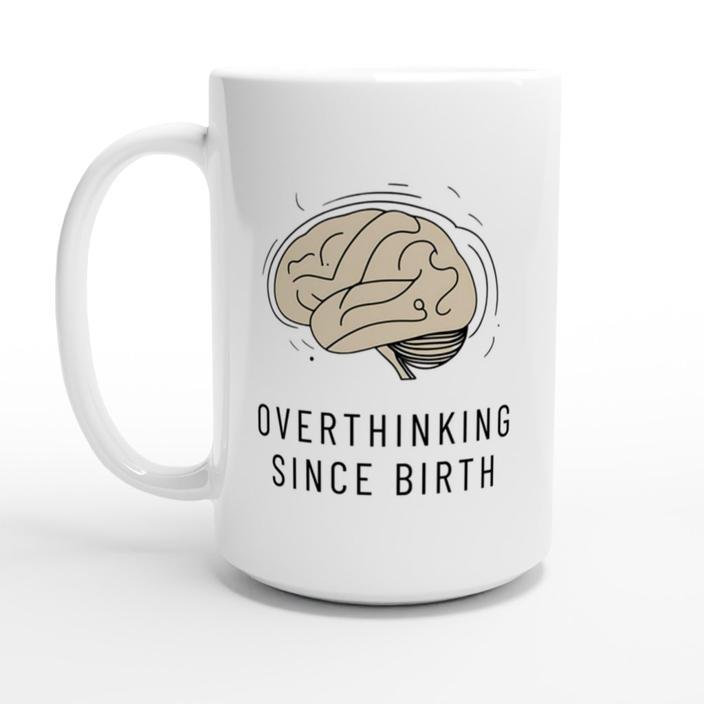 White mug with brain graphic and text 'Overthinking Since Birth' on a white background
