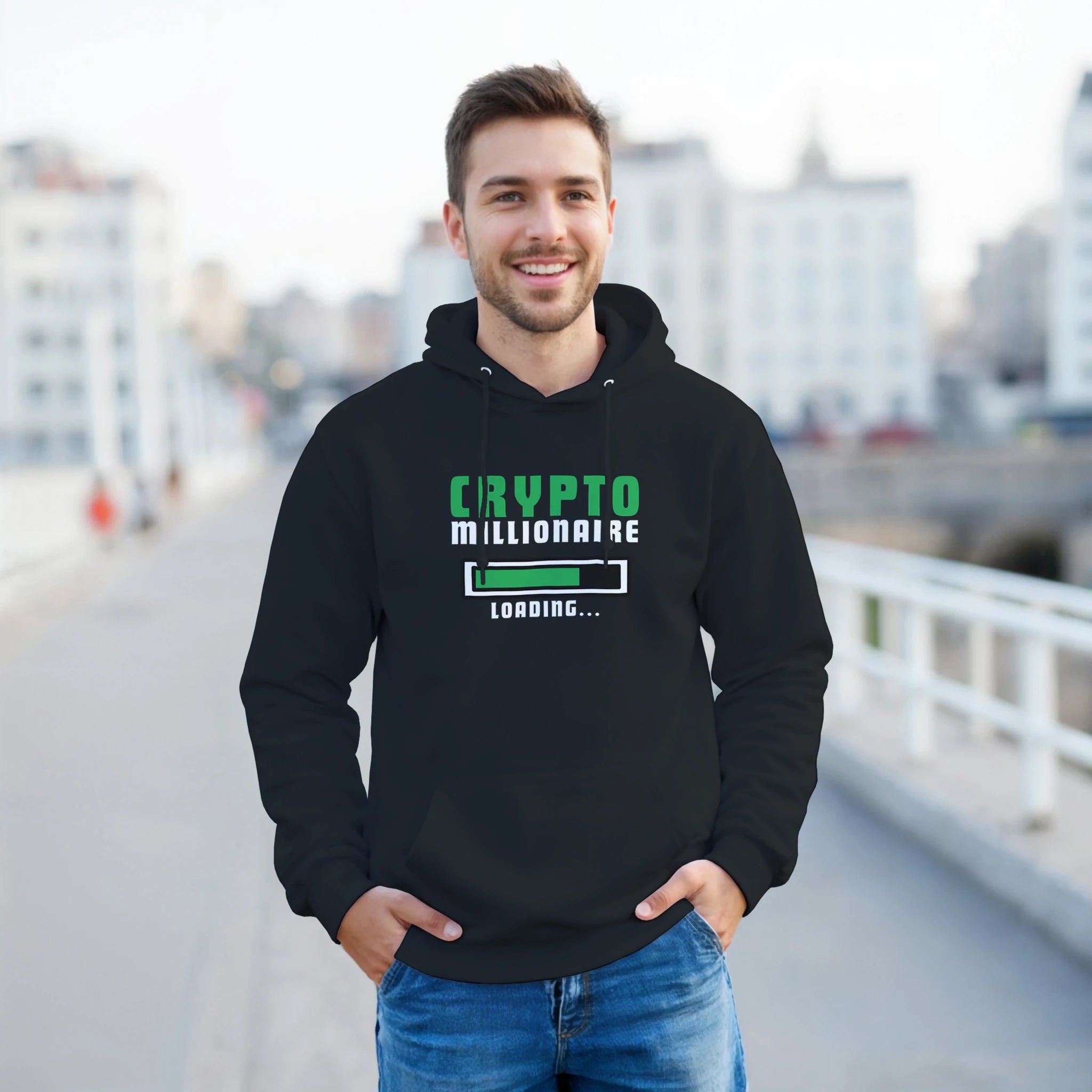 Man wearing a black hoodie with 'Crypto Millionaire Loading' text outdoors.