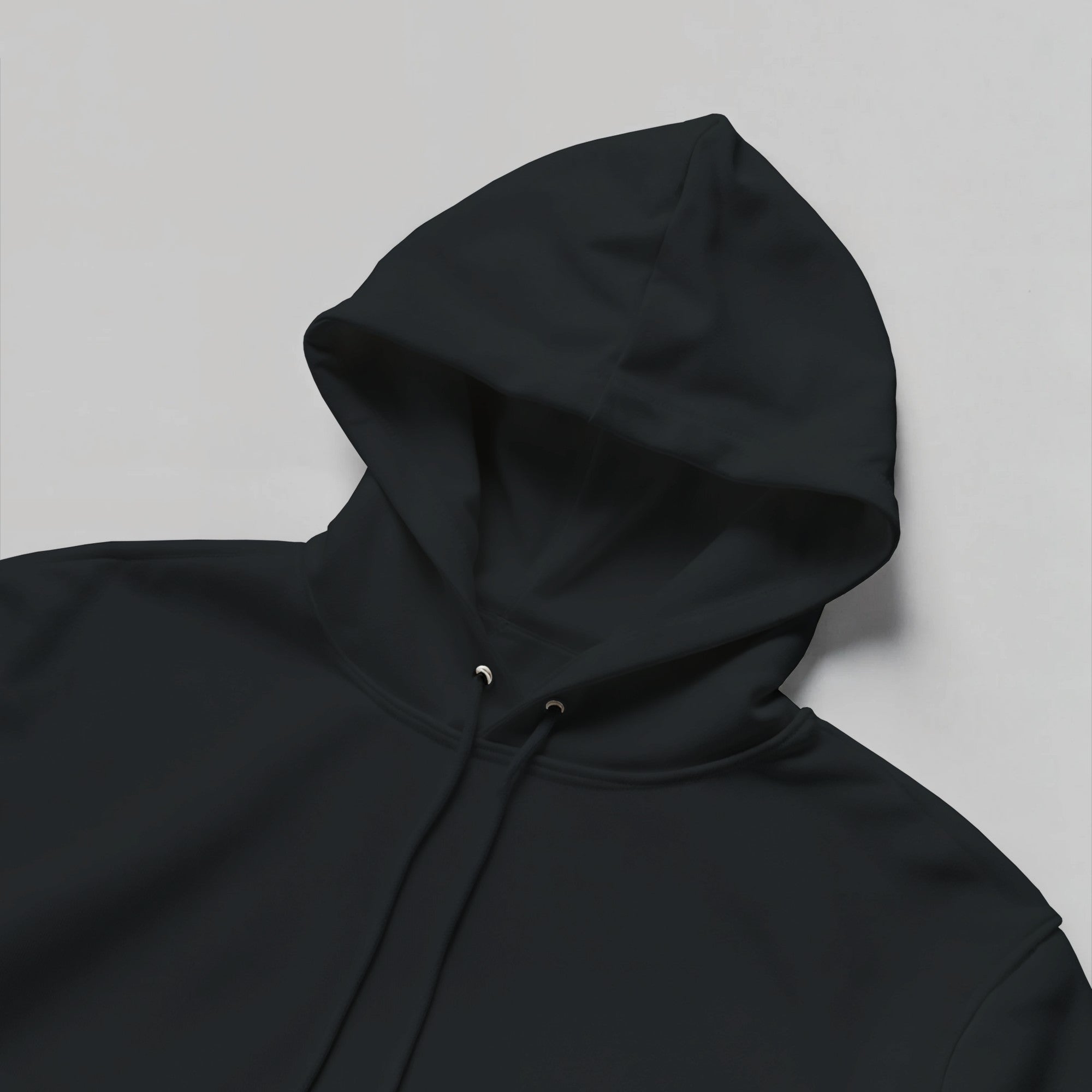 Black hoodie on a light gray background
