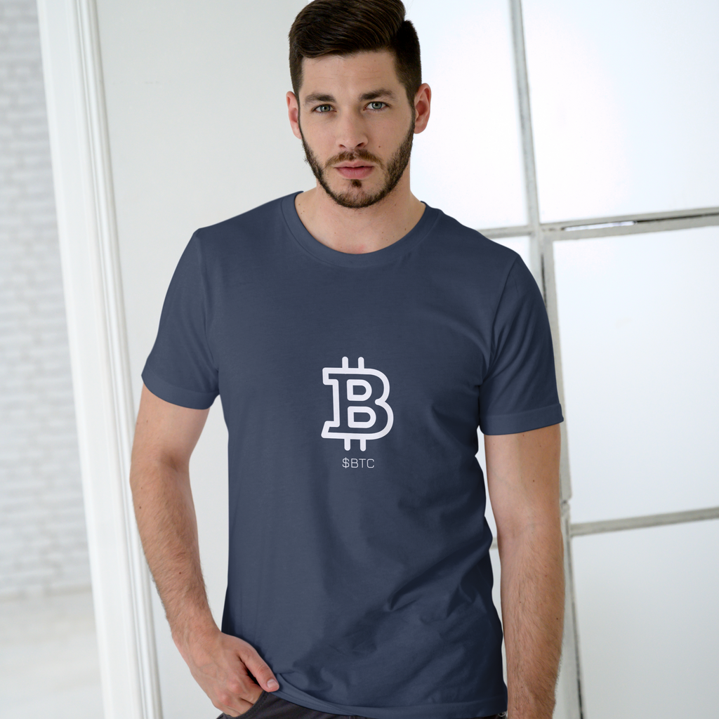 Man wearing a navy blue t-shirt with a Bitcoin logo on a light background
