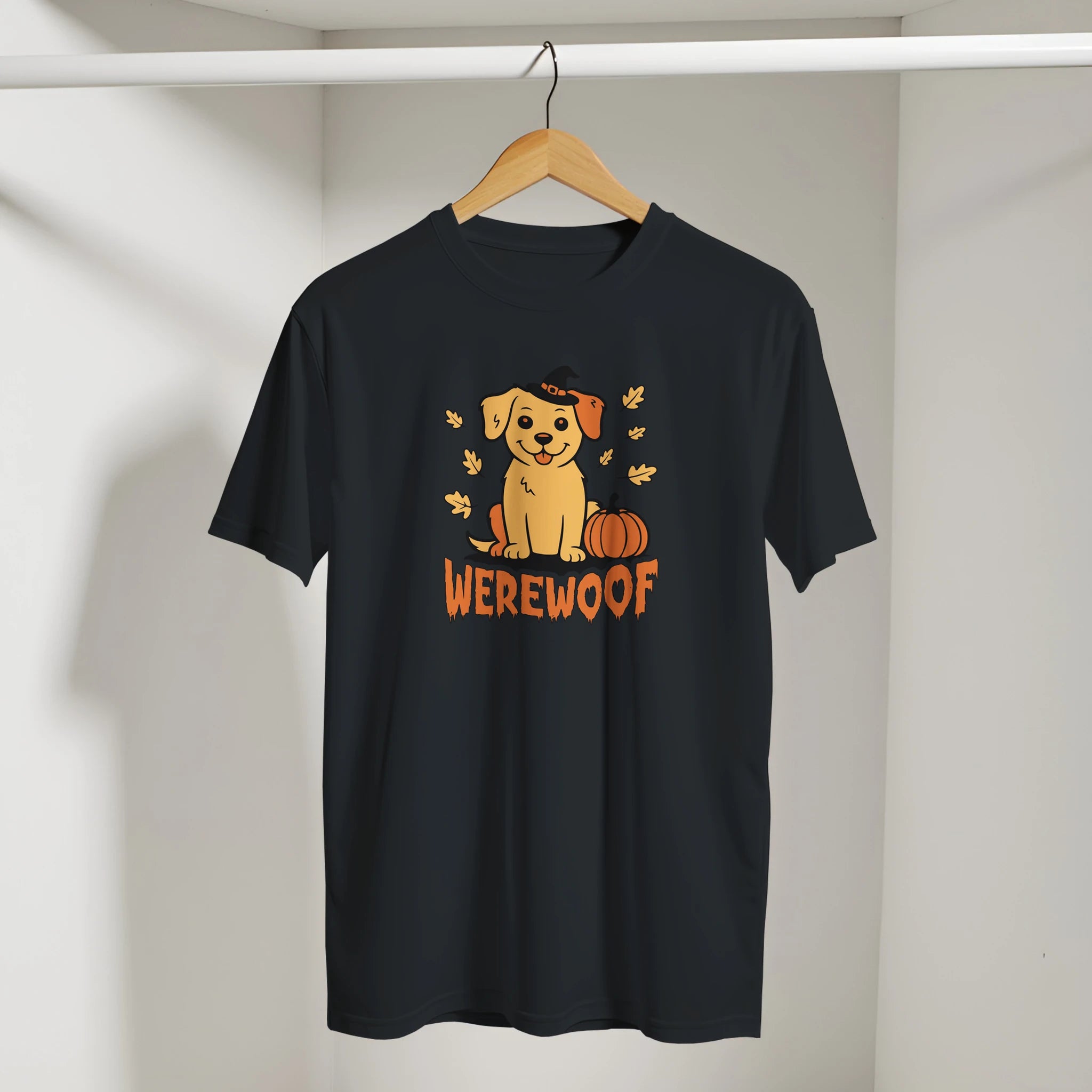 Black t-shirt with a dog graphic and 'WEREWOLF' text on a hanger against a white wall.