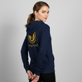 Woman wearing a navy hoodie with a yellow logo and text on a gray background