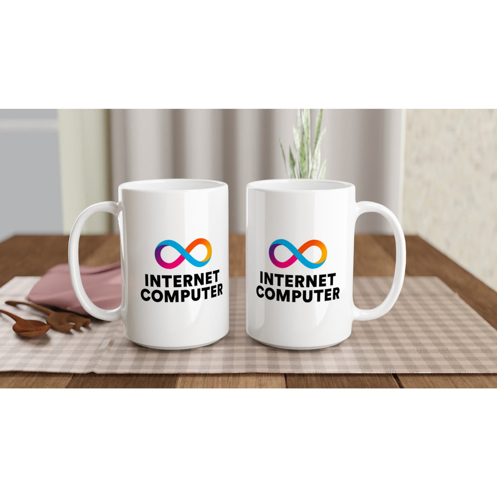 Two white mugs with 'Internet Computer' logo on a wooden table.