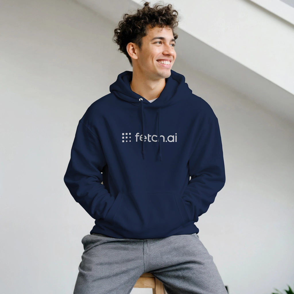 Person wearing a navy hoodie with 'fetch.ai' logo against a light background