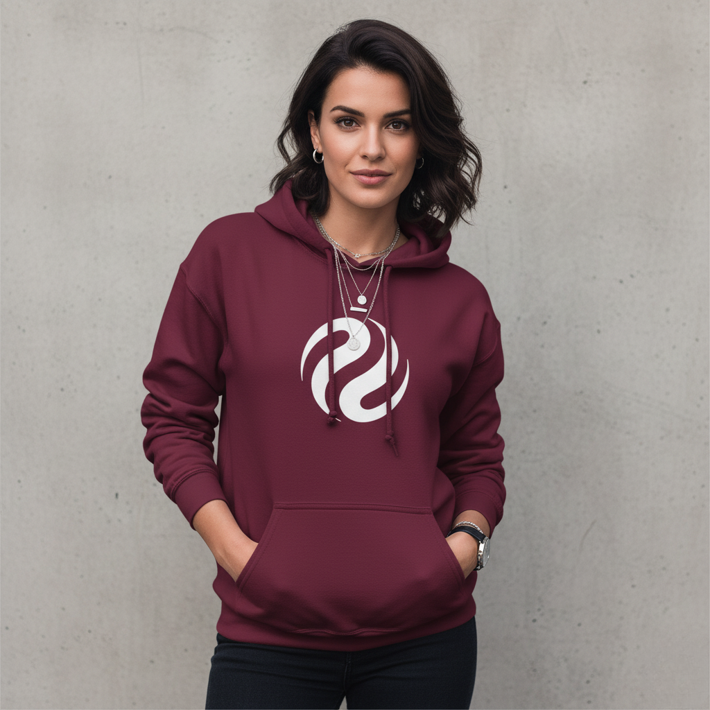 Woman wearing a maroon hoodie with a white logo against a gray background