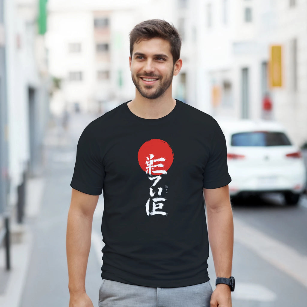 Man wearing a black t-shirt with a red and white design on a city street