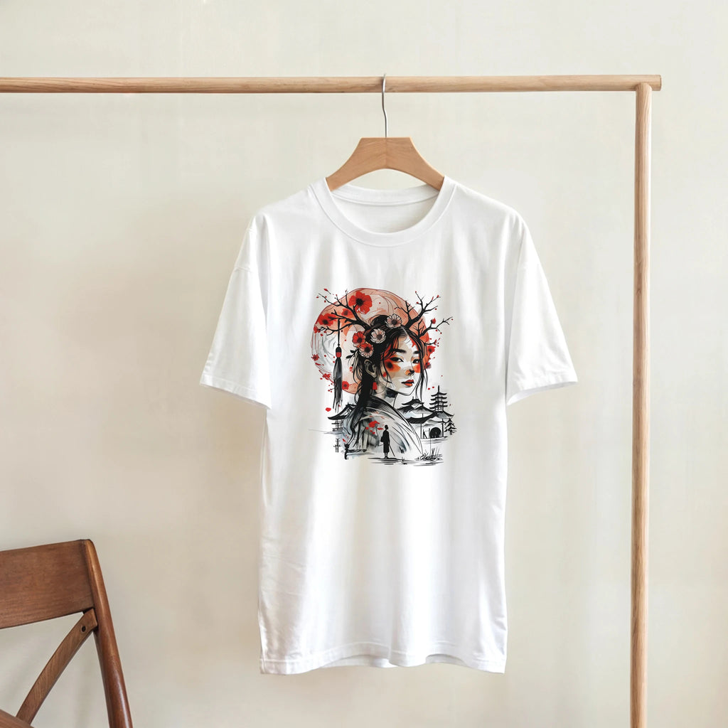 White t-shirt with a graphic design on a wooden hanger against a beige wall.