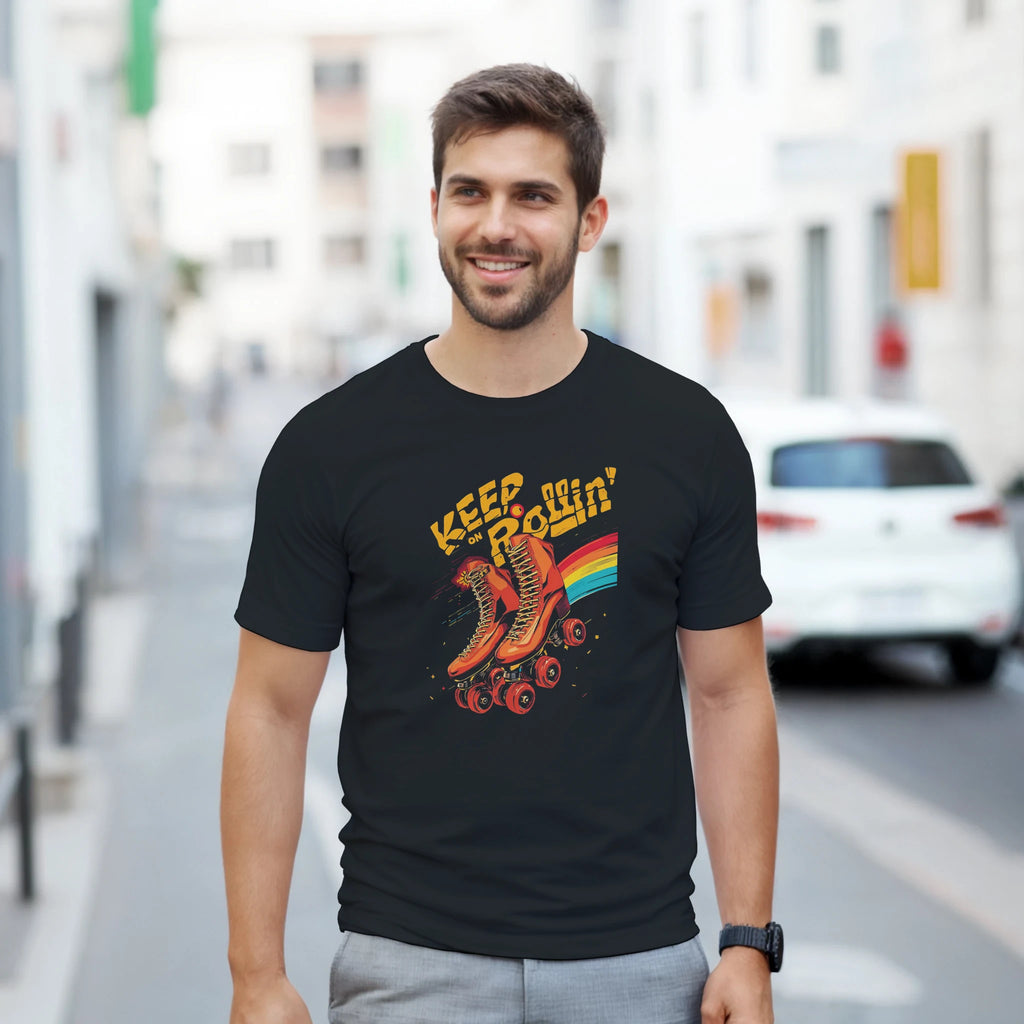 Man wearing a black t-shirt with colorful graphic design on a city street