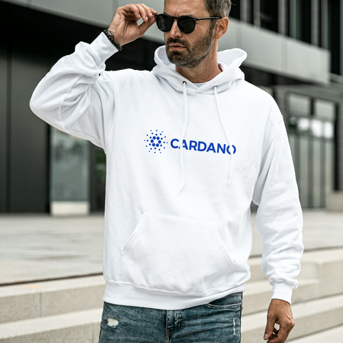 Man wearing a white hoodie with Cardano logo outdoors
