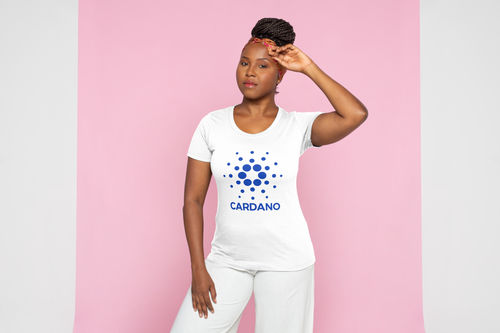 Woman wearing a white t-shirt with Cardano logo on a pink background