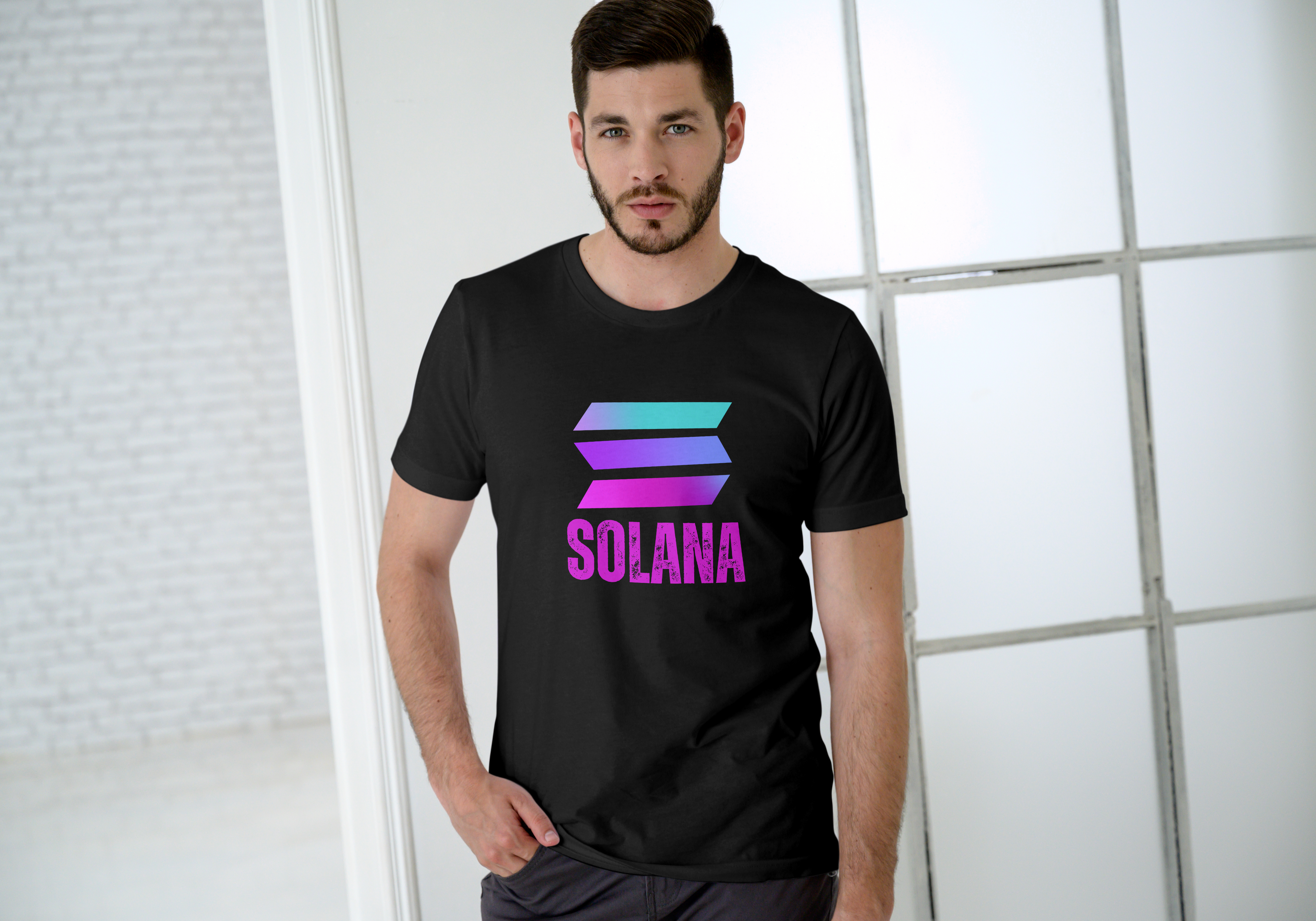 Man wearing a black t-shirt with Solana logo and text against a light background