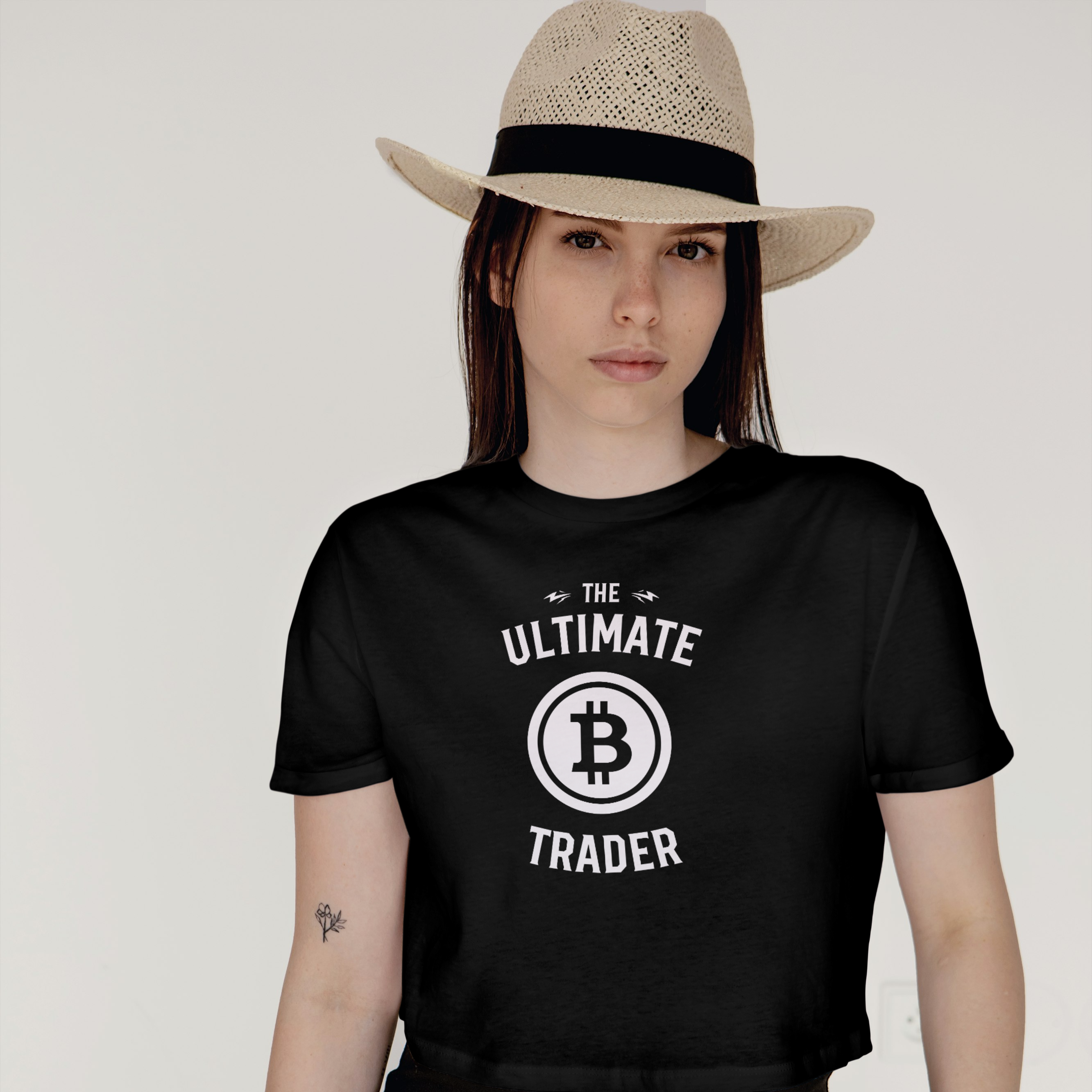 Person wearing a black t-shirt with 'The Ultimate Bitcoin Trader' design.