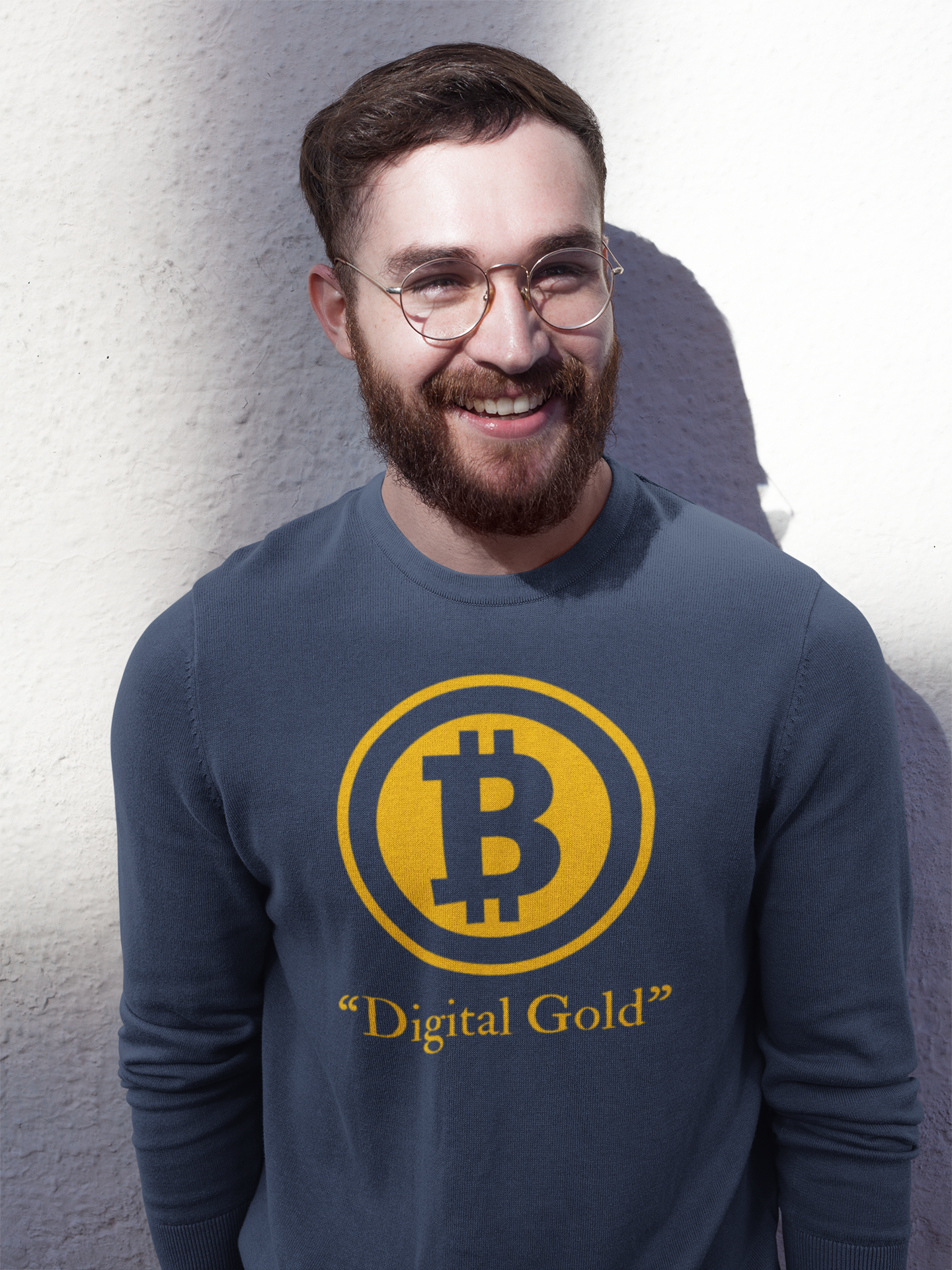 Man wearing a sweater with a Bitcoin logo and 'Digital Gold' text against a light background