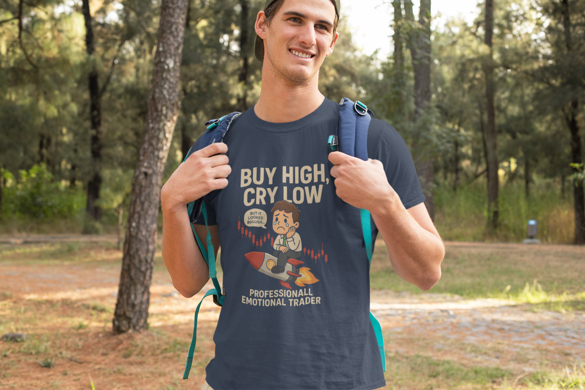 Man wearing a t-shirt with a graphic design and text, standing outdoors.
