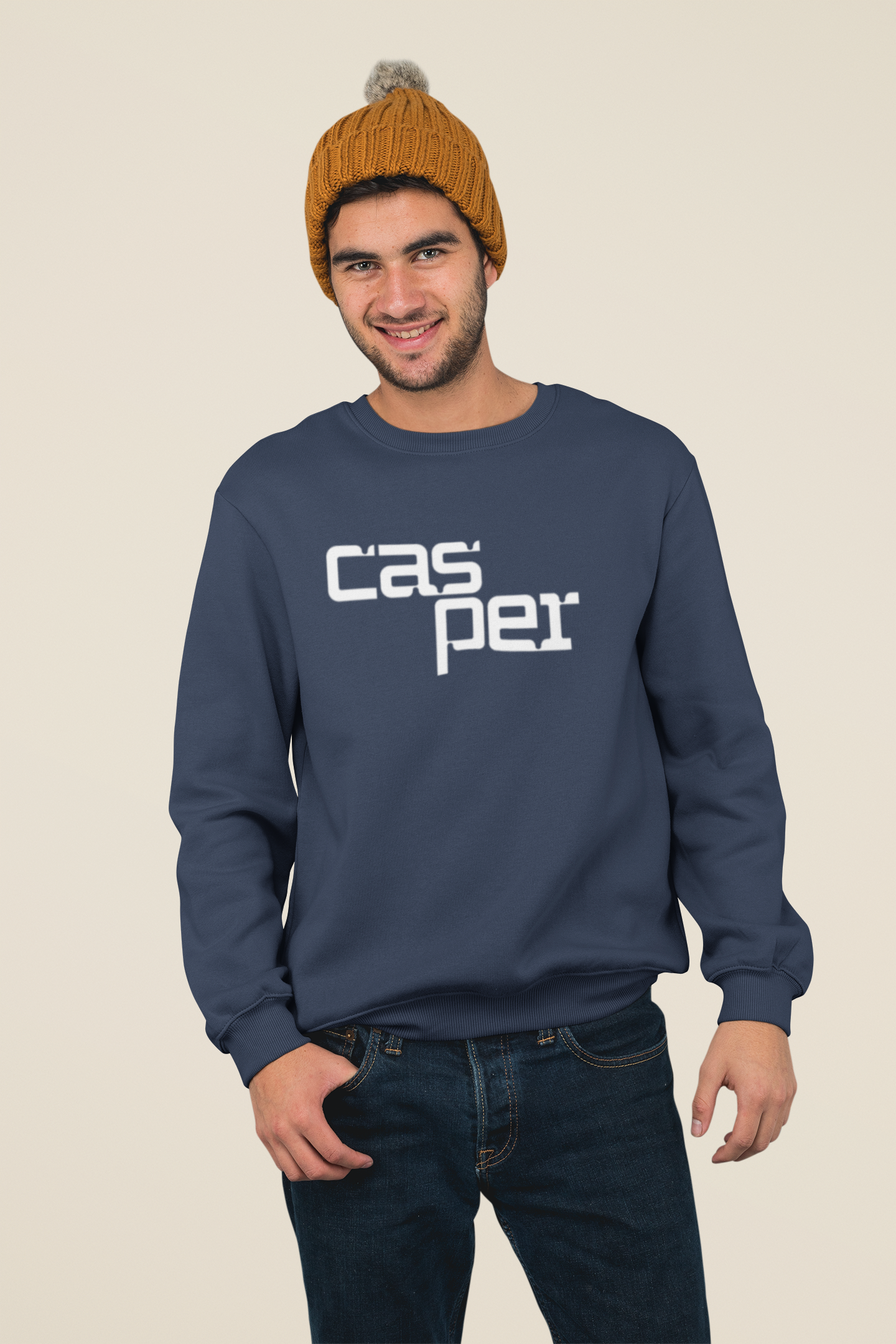 Man wearing a navy blue sweatshirt with 'Casper' logo on a beige background