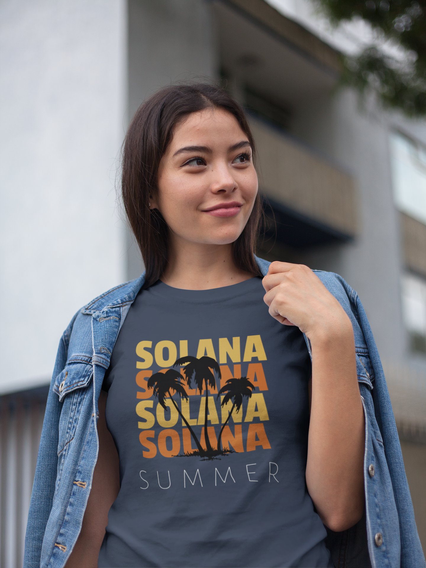 Woman wearing a t-shirt with 'Solana Summer' text and bear graphic.