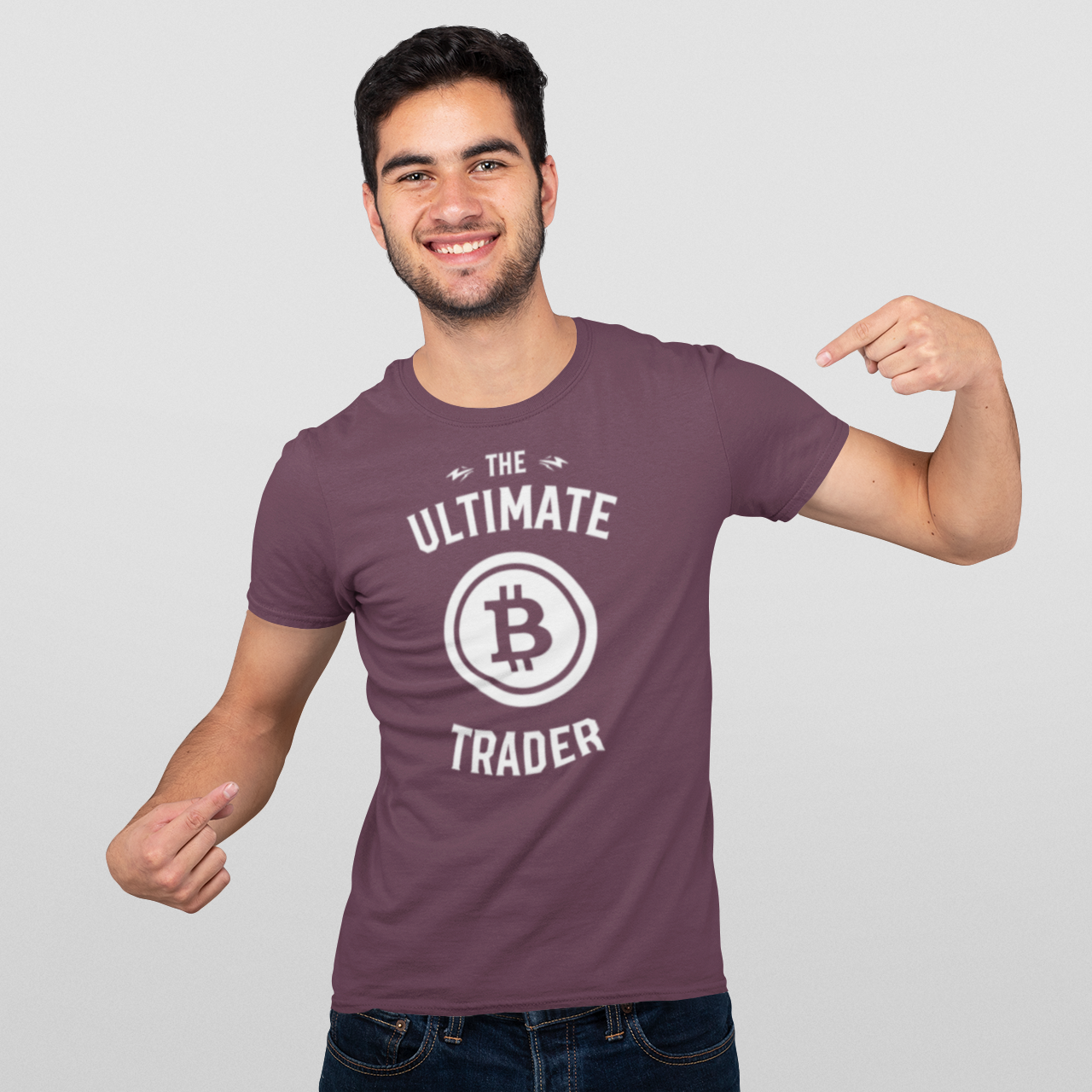 Man wearing a purple t-shirt with 'The Ultimate Bitcoin Trader' design on a plain background