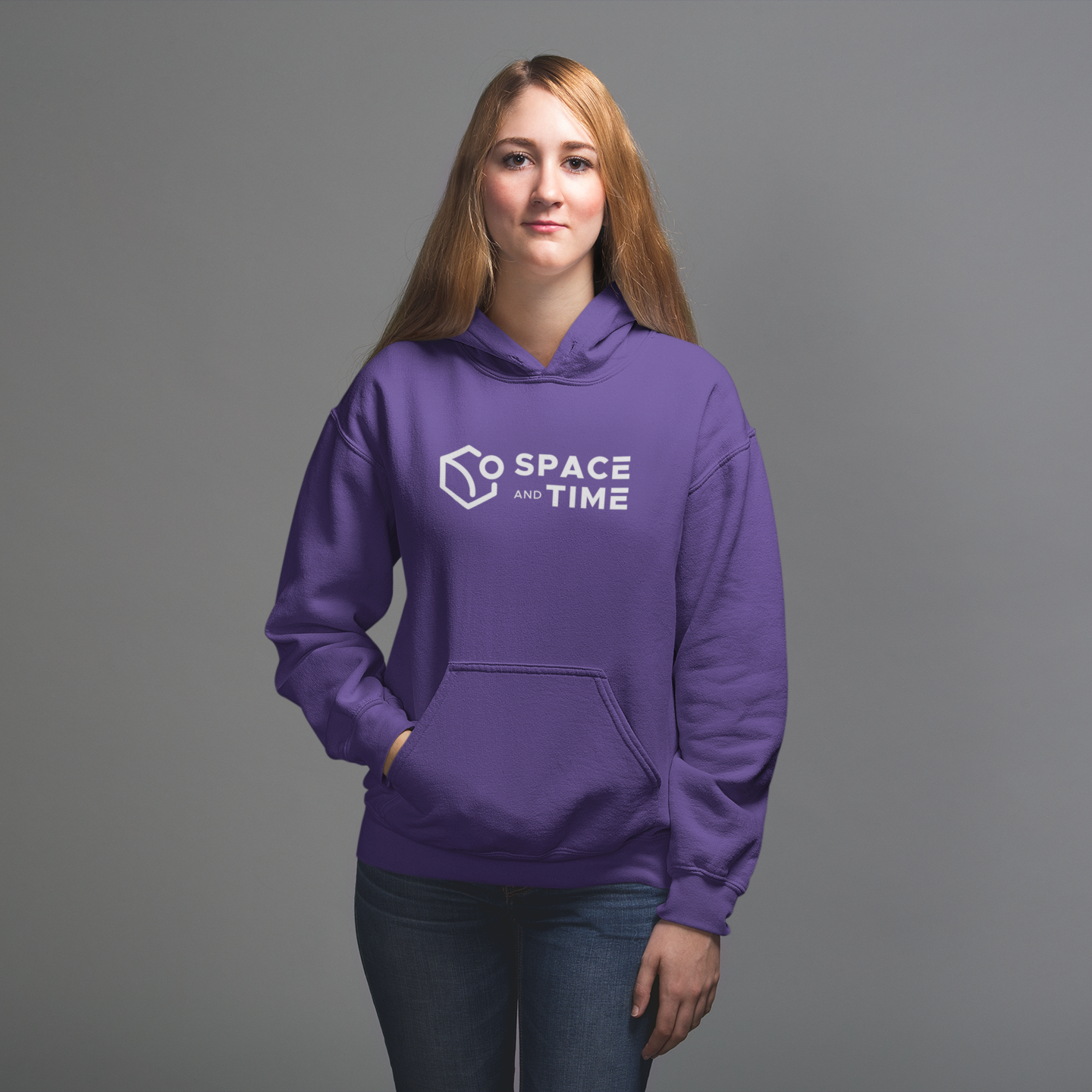 Person wearing a purple hoodie with 'Space and Time' logo on a gray background