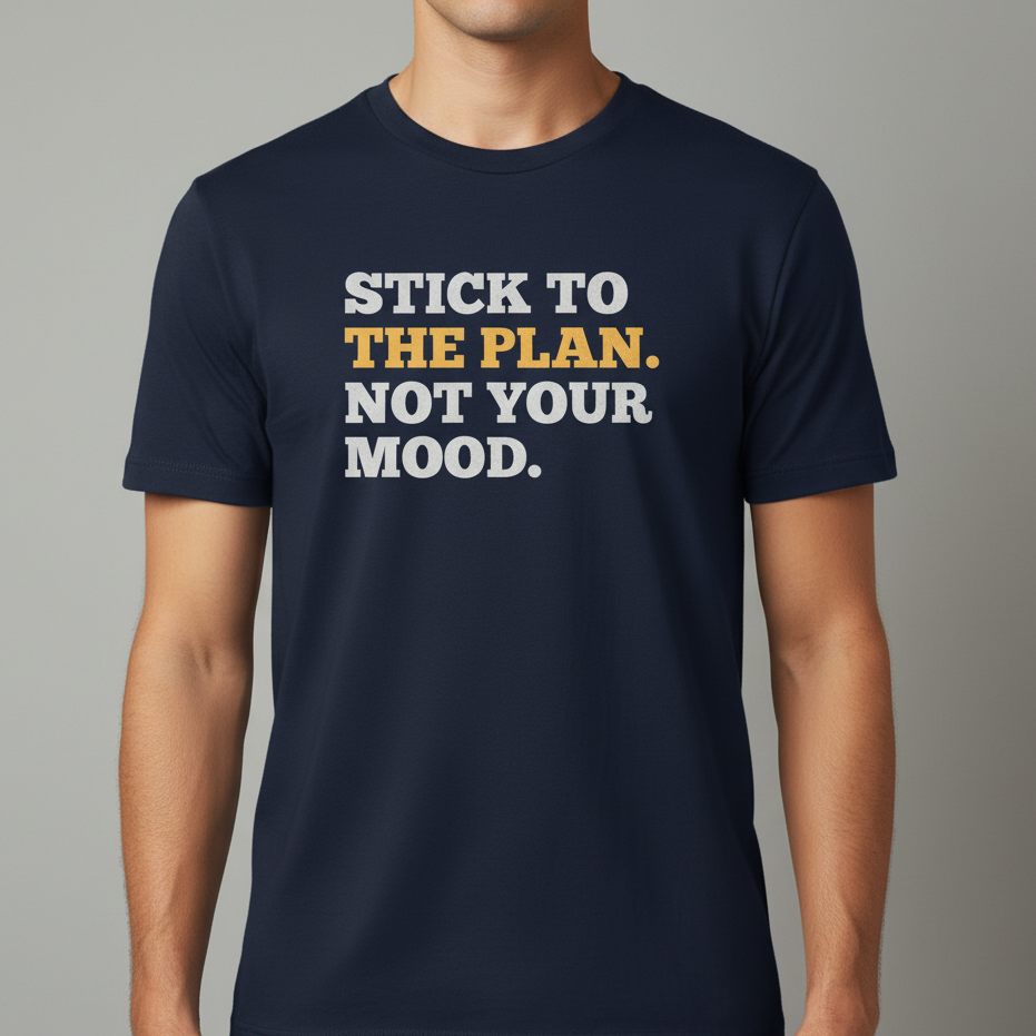 Navy blue t-shirt with motivational text on a gray background